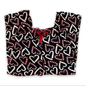 Faded Glory Heart Shaped Candy Canes on Black Fleece Background Size M (8-10)